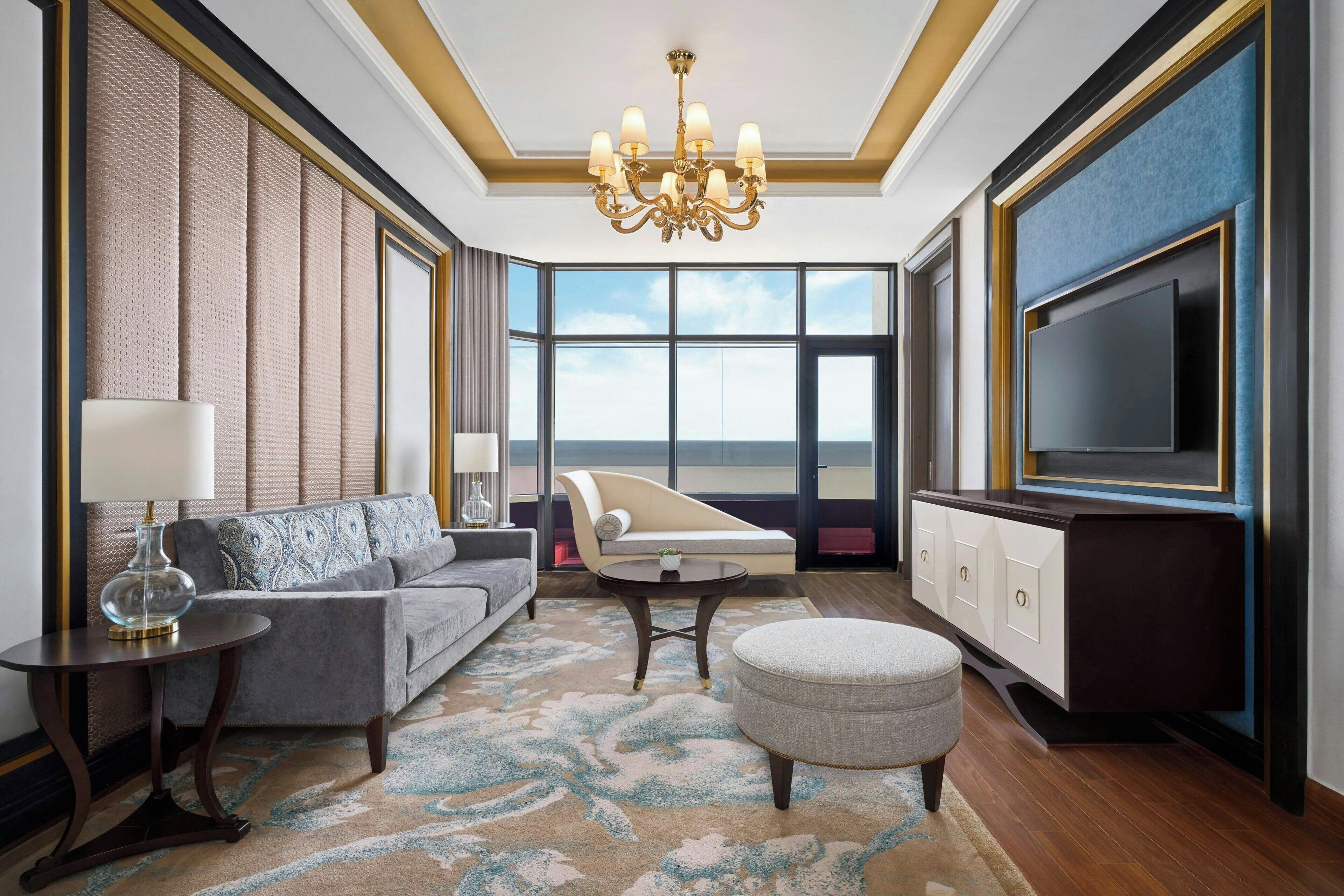 Club Suite, 1 King Bed, Terrace | Living room | 40-inch LCD TV with cable channels, TV