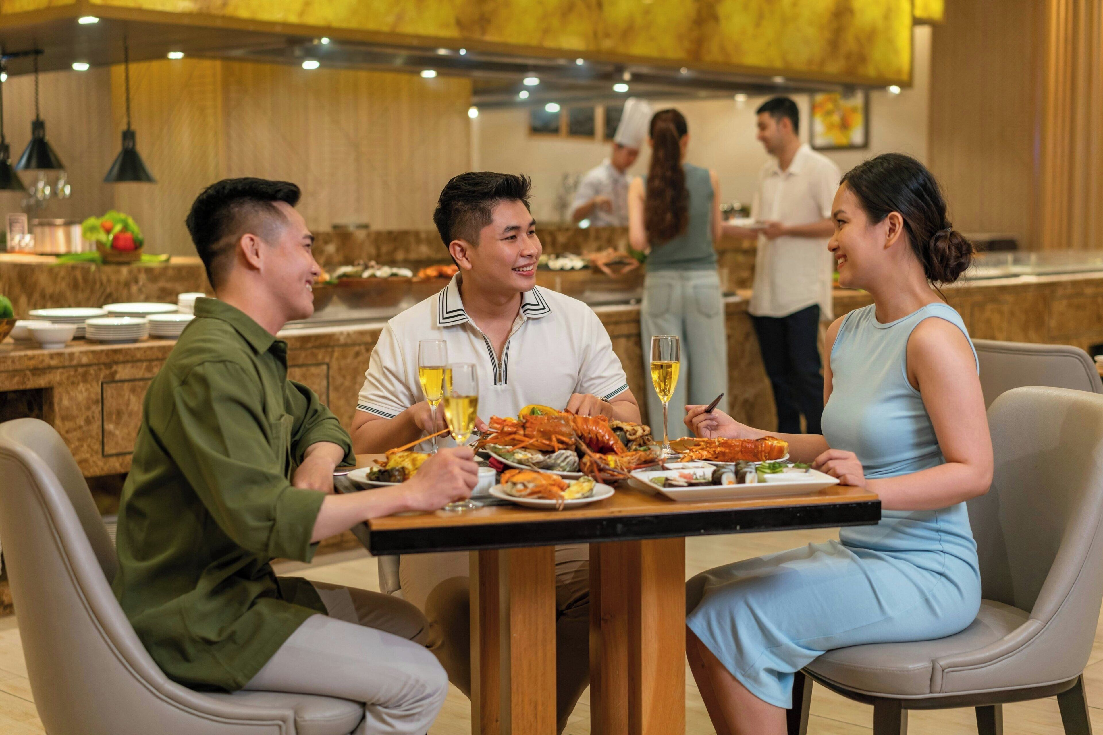 A restaurant setting with a dining table, chairs, and a counter with food items.