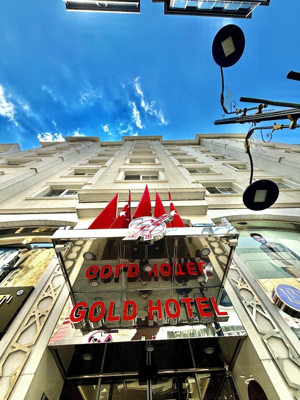 The exterior of the Gold Hotel with a clear view of its facade and signage. - Gold Hotel (Istanbul)