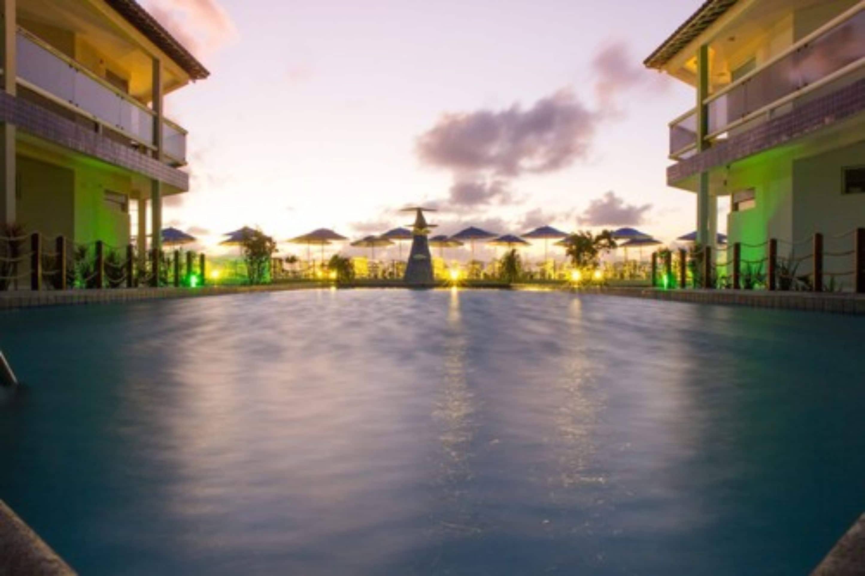 outdoor pool, pool umbrellas, pool loungers