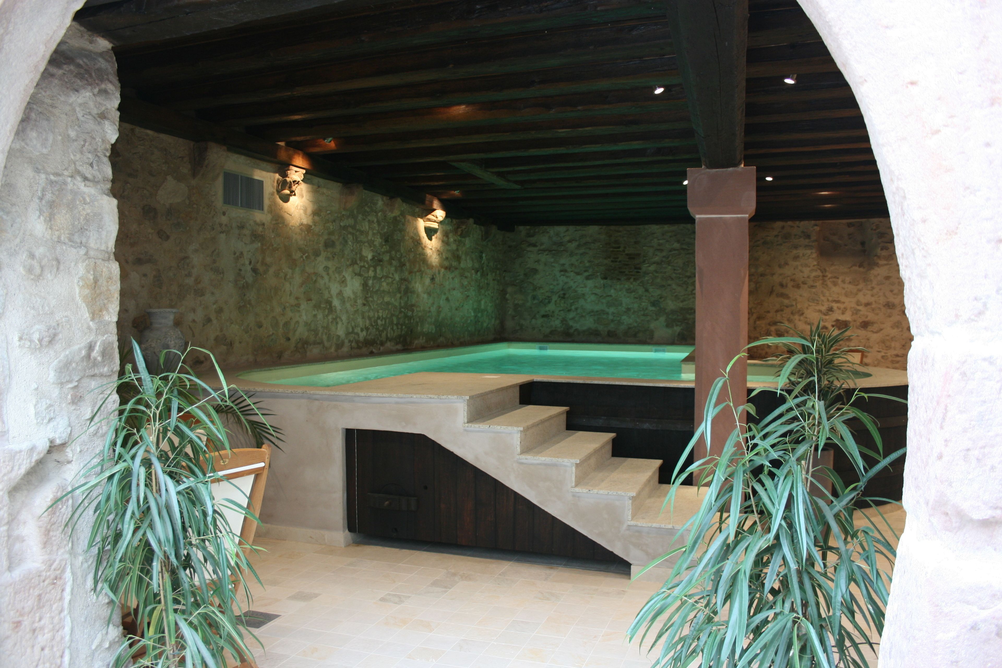 indoor pool, open 9:00 am to 7:00 pm, pool loungers