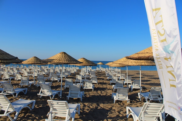 Private beach nearby, free beach shuttle, sun loungers, beach umbrellas