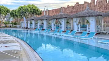 Indoor pool, free pool cabanas, pool umbrellas