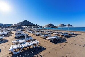 Private beach nearby, free beach shuttle, sun loungers, beach umbrellas