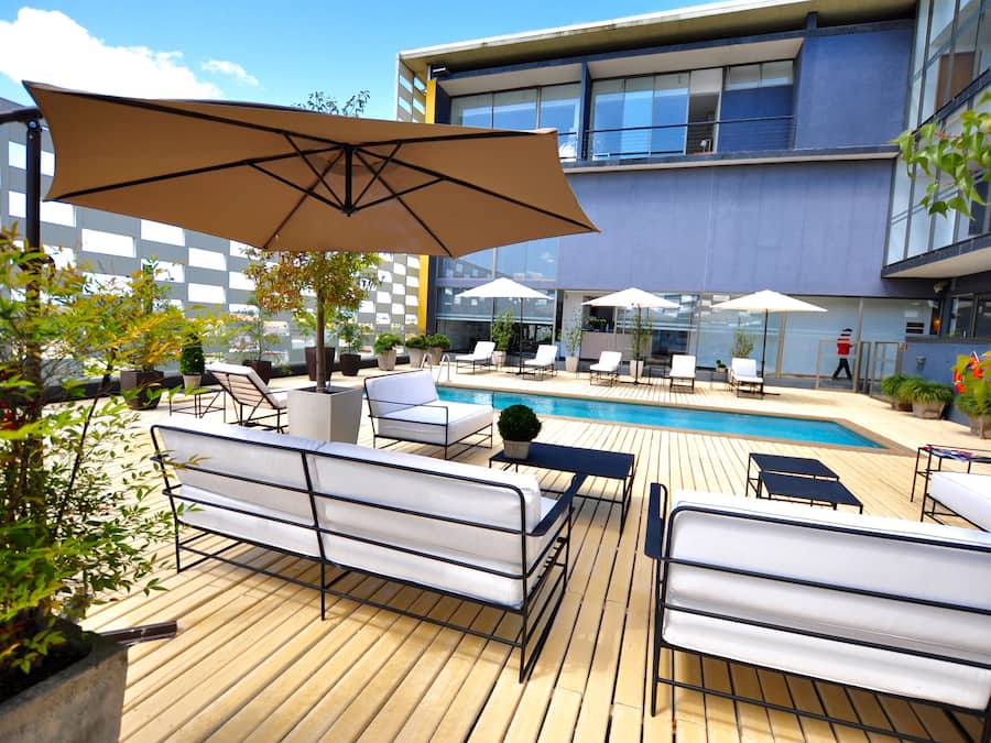 Seasonal outdoor pool, pool umbrellas, pool loungers