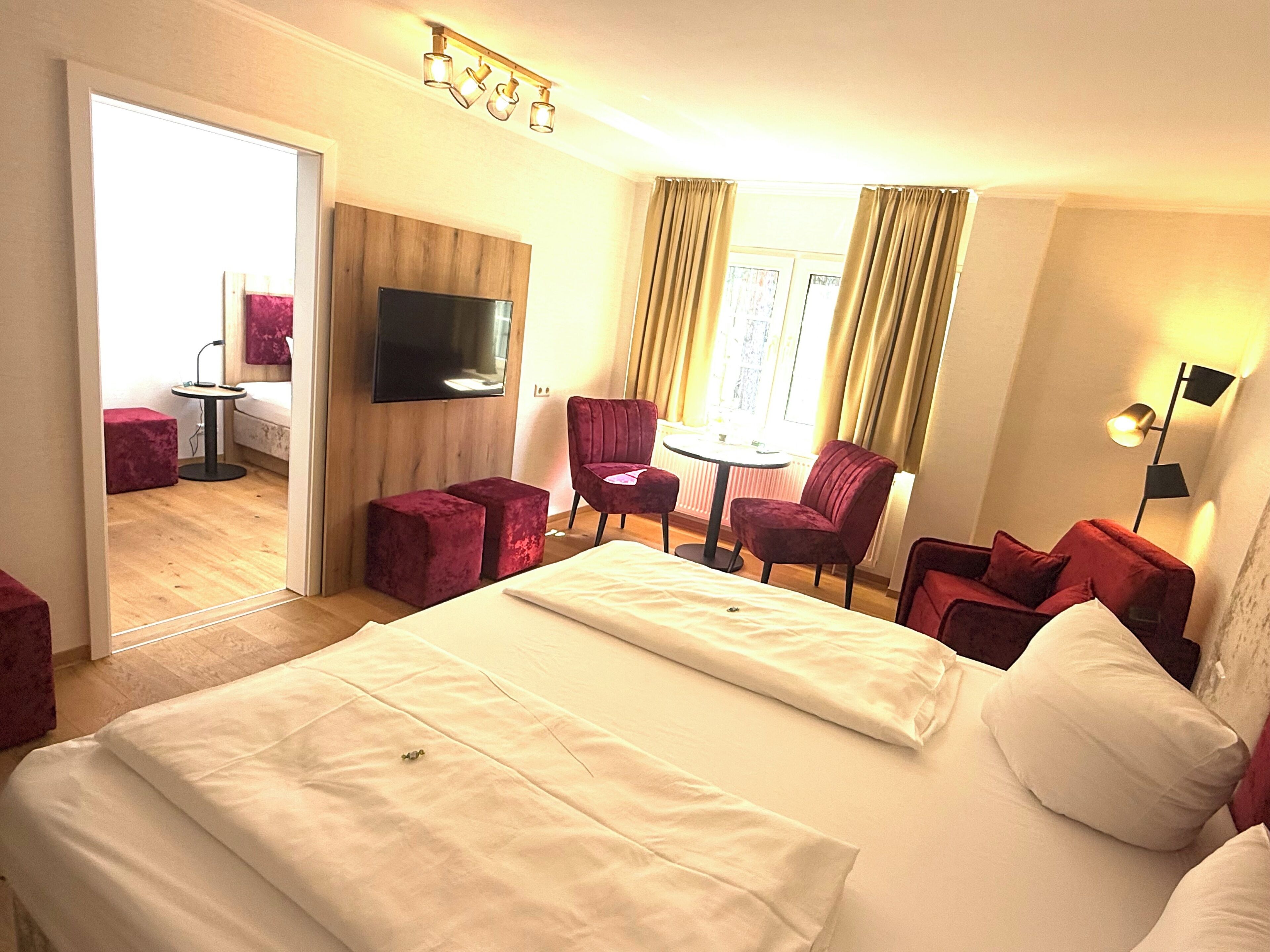 Family Quadruple Room | Minibar, iron/ironing board, free WiFi, bed sheets