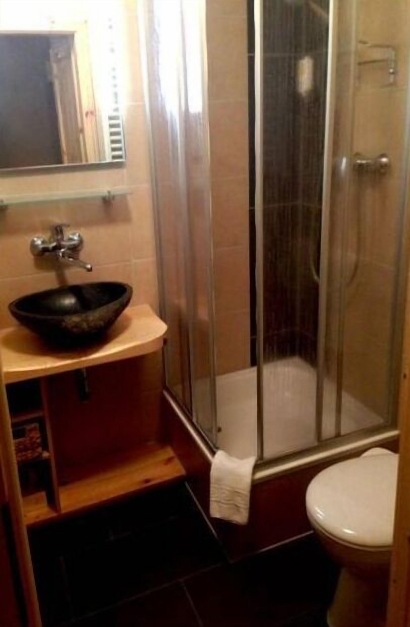 Shower, rainfall showerhead, hair dryer, towels