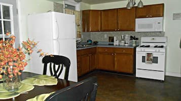 Cottage, 5 Bedrooms | Private kitchen | Fridge, microwave, stovetop, coffee/tea maker