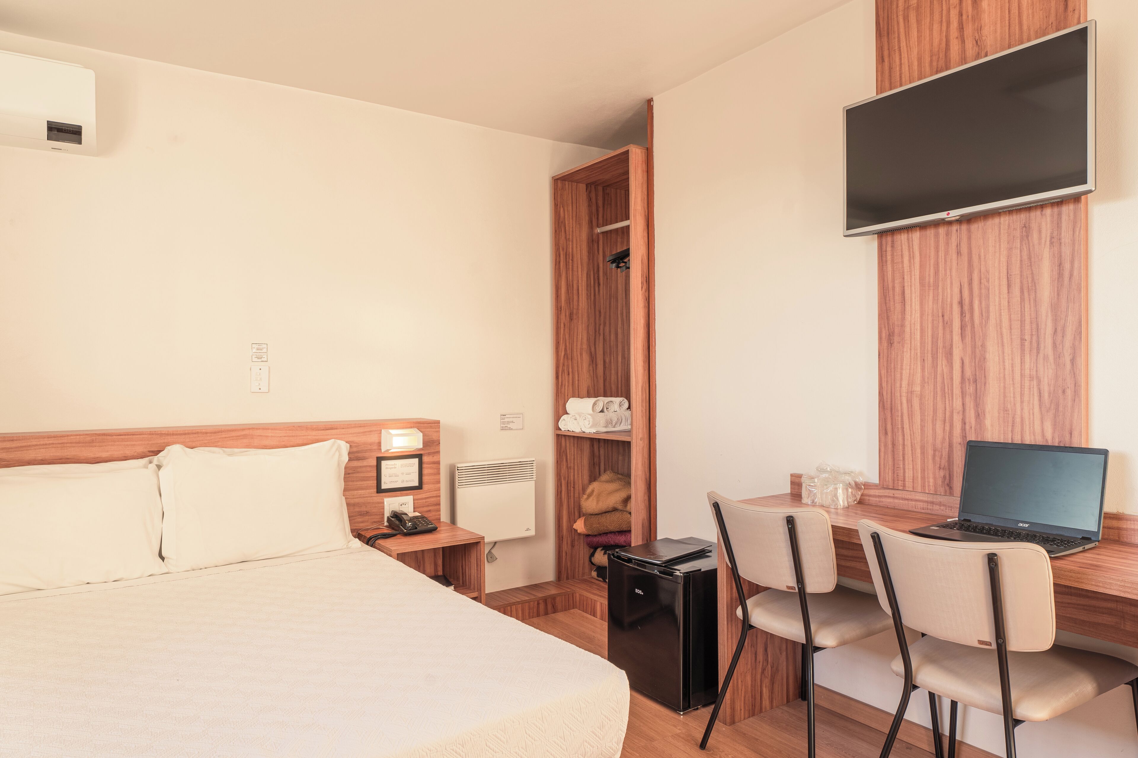 deluxe room, city view | 1 bedroom, minibar, desk, blackout curtains