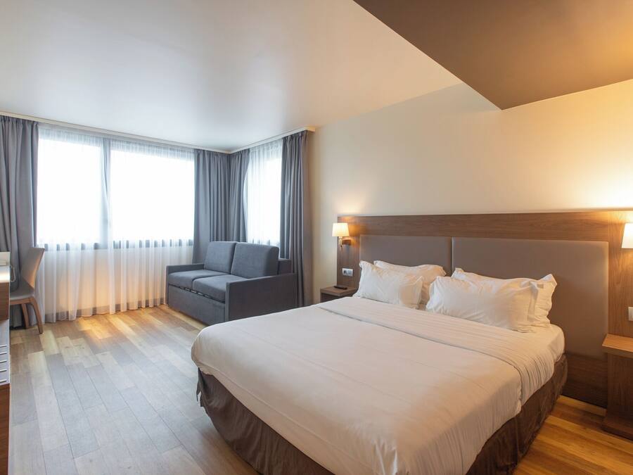Standard Room, Multiple Beds | 1 bedroom, premium bedding, desk, blackout drapes