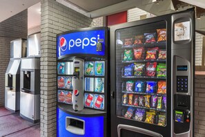 A vending machine with a Pepsi logo, offering various snacks and drinks. - Red Roof Inn Doswell - Kings Dominion (Doswell)