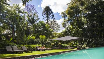 Outdoor pool, open 6:30 AM to 6:30 PM, pool loungers