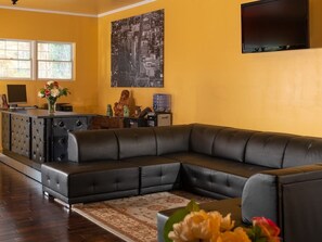 50-inch flat-screen TV with satellite channels, TV