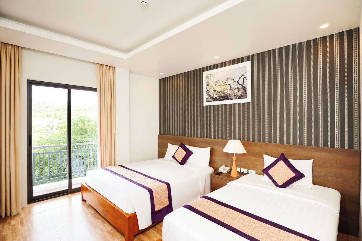 Phòng 3 Executive, quang cảnh biển | Minibar, két bảo mật tại phòng, bàn