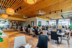 Breakfast, lunch, dinner served; local and international cuisine 