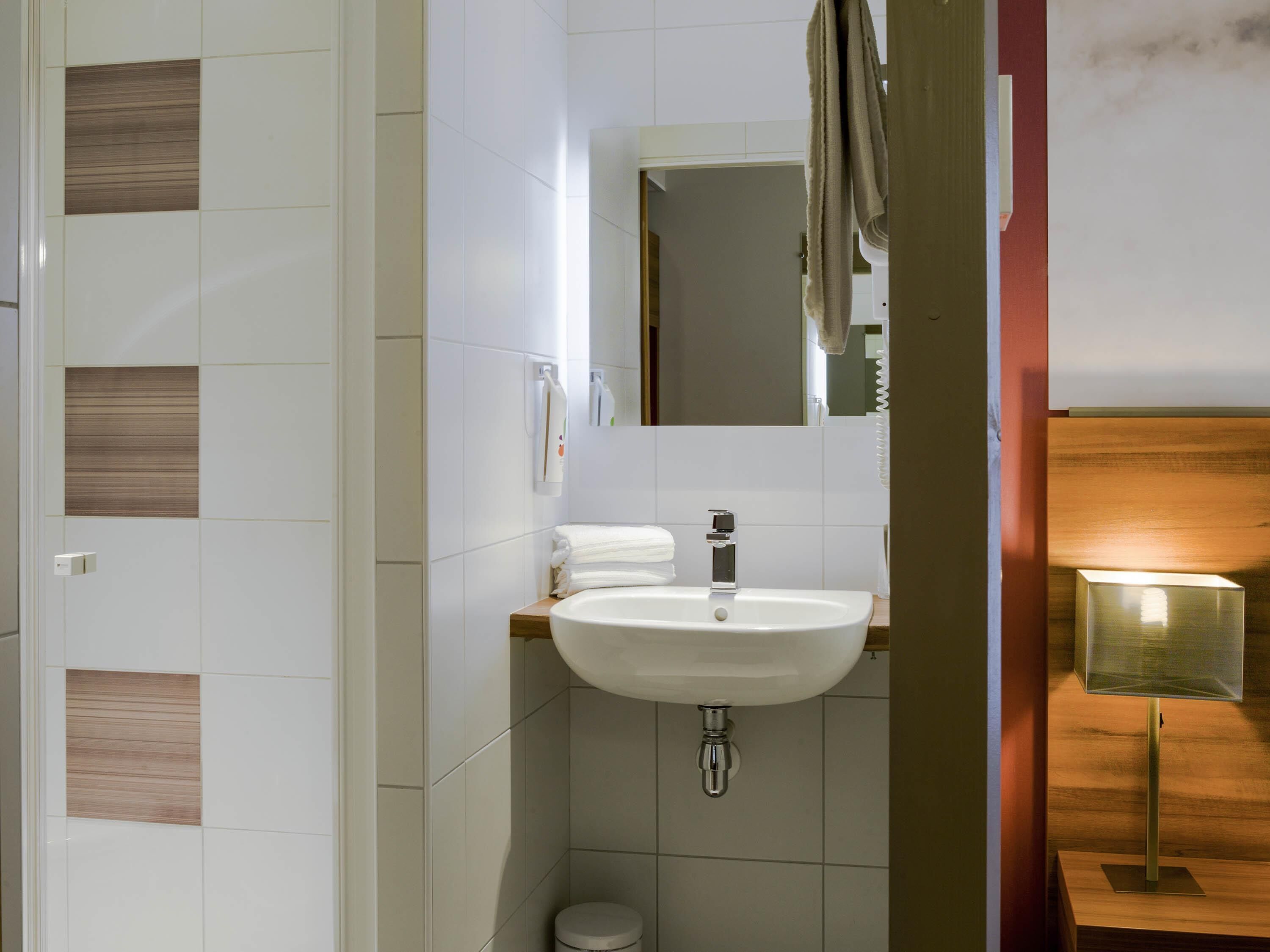 premium bedding, pillow-top beds, desk, blackout curtains