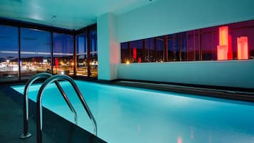 Indoor pool, open 7:00 AM to 10:00 PM, pool loungers