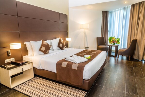 Egyptian cotton sheets, premium bedding, minibar, in-room safe