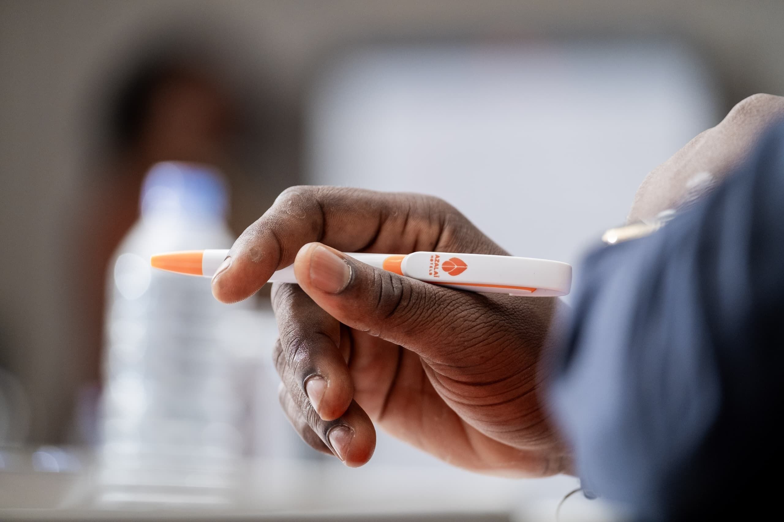 A person holding a pregnancy test.
