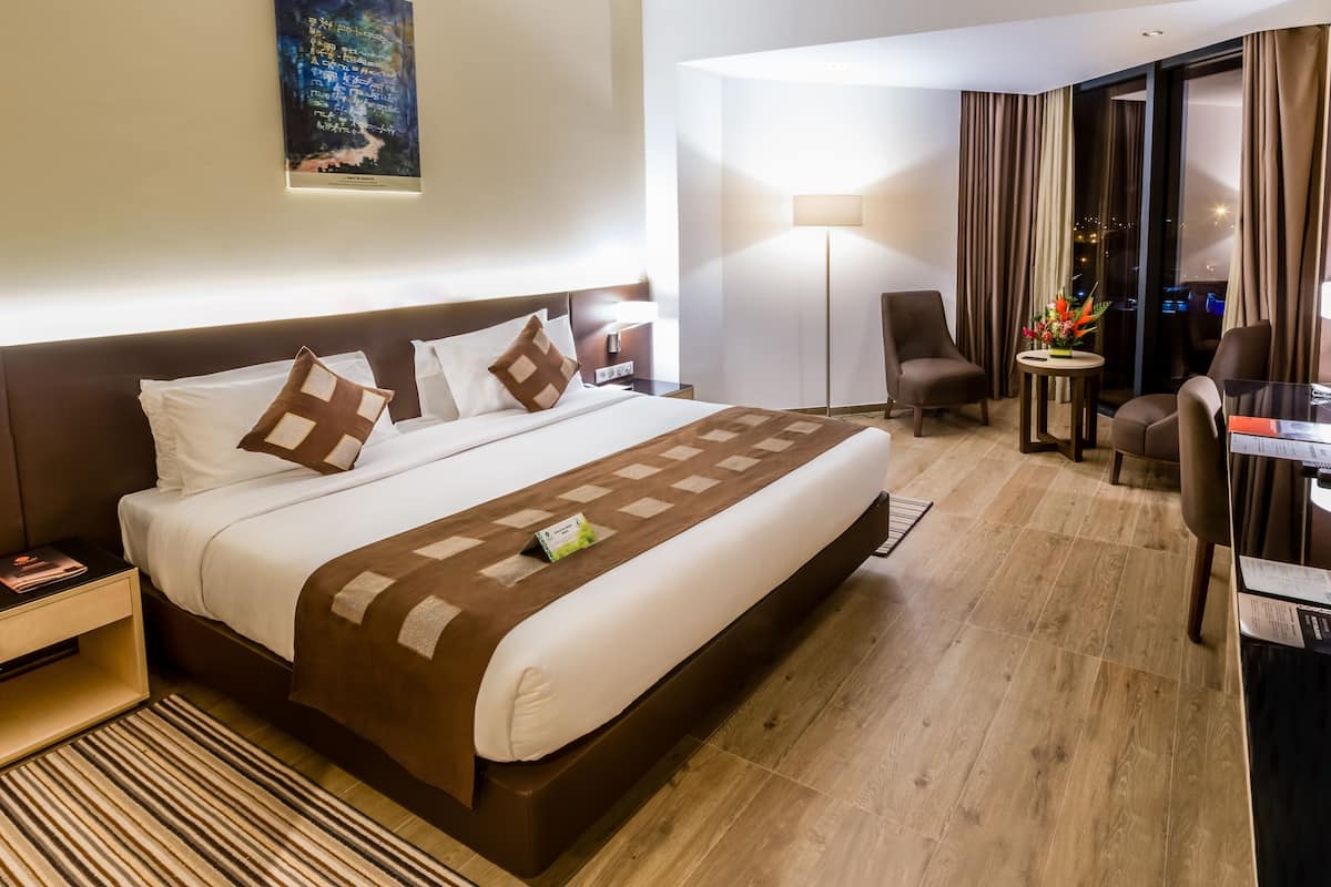 Egyptian cotton sheets, premium bedding, minibar, in-room safe