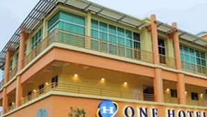 A hotel with a prominent 'ONE HOTEL' sign, multiple balconies, and a modern architectural design. - One Hotel Lintas Jaya (Kota Kinabalu)