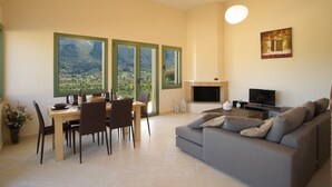 Villa, 3 Bedrooms | Living room | 32-inch flat-screen TV with satellite channels, TV, fireplace - Utopia Luxury Villa (Kefalonia)