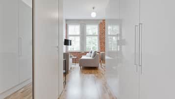 Apartment, 1 Bedroom | Desk, iron/ironing board, free WiFi, bed sheets