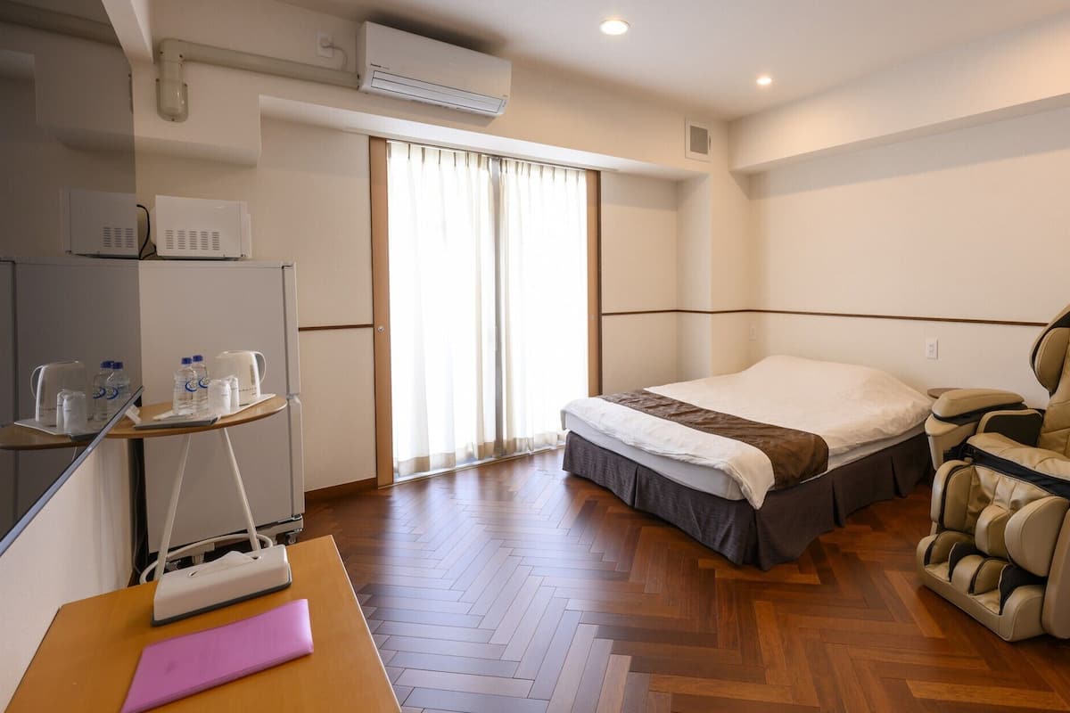Blackout curtains, soundproofing, iron/ironing board (on request)