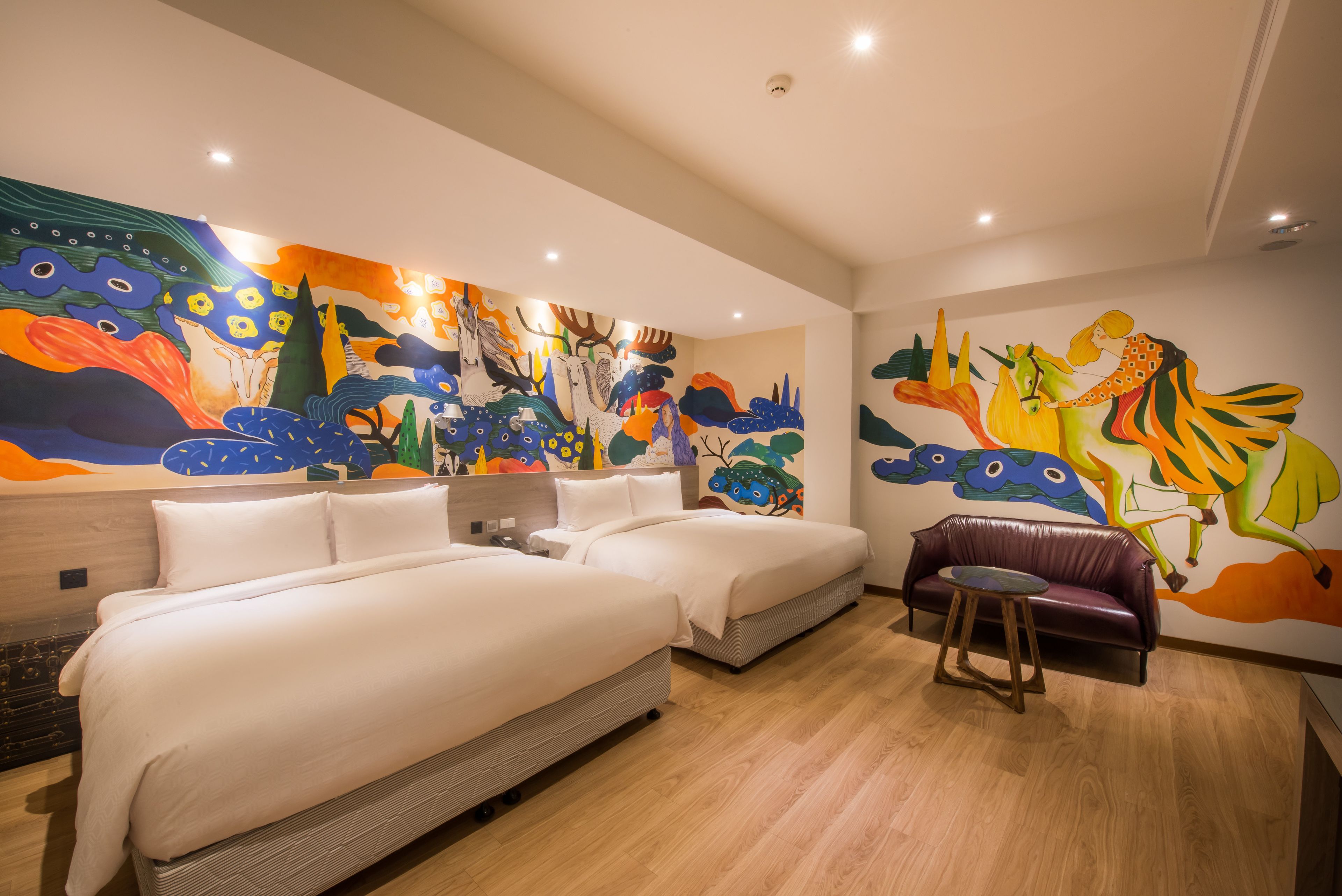 deluxe quad room | down duvets, free minibar, in-room safe, desk