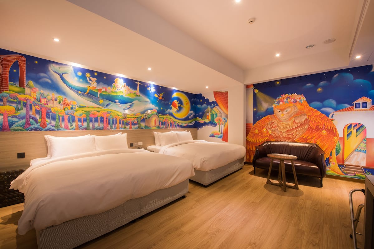 deluxe quad room | down duvets, free minibar, in-room safe, desk