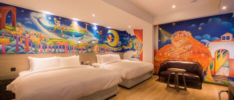 A hotel room with two beds, a wooden floor, and a mural on the wall depicting a whimsical scene with a whale, stars, and a rainbow.