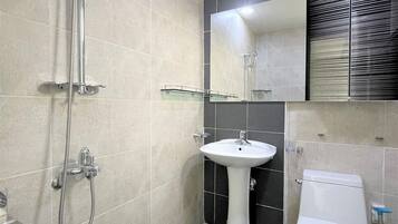 Shower, free toiletries, hair dryer, slippers