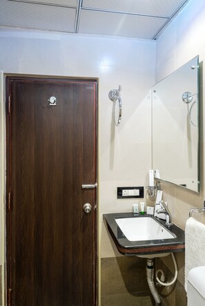 Standard Room | Bathroom sink - Treebo Empire (Vijayawada)