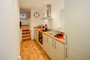 Appartement, 1 chambre | 1 chambre, fer et planche à repasser, accès au Wi-Fi (inclus)