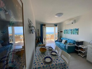 Appartement, 1 chambre | Coin séjour | Télévision à écran plat