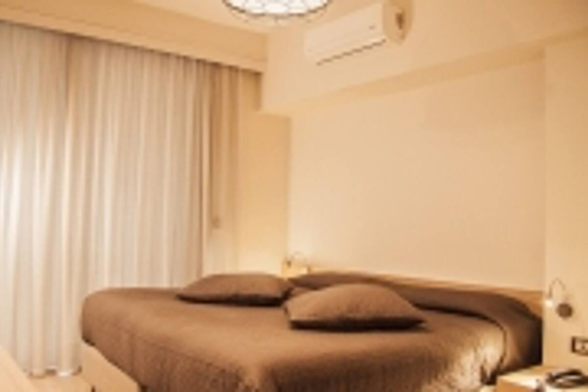 Luxury Apartment, 1 Bedroom, Annex Building | In-room safe, blackout drapes, soundproofing, iron/ironing board