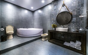 Deluxe Family Suite | Bathroom | Shower, designer toiletries, hair dryer, slippers - Oliving Residence (Hanoi)