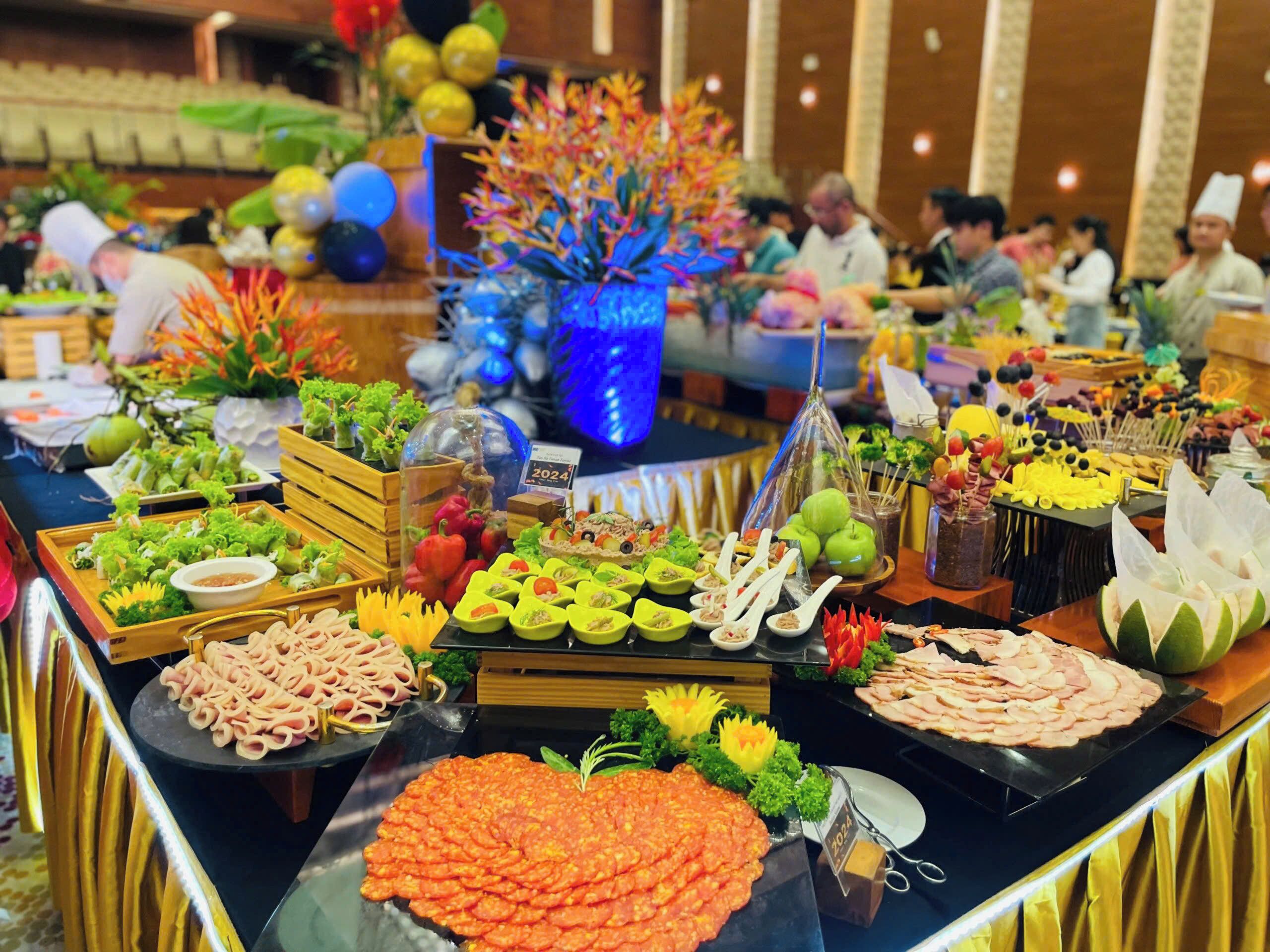 A buffet table with various food items and decorations.