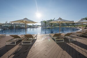 Outdoor pool, open 6:00 AM to 9:00 PM, pool umbrellas, sun loungers