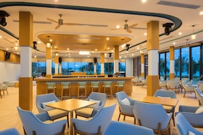 Lunch, dinner served; international cuisine, golf course views