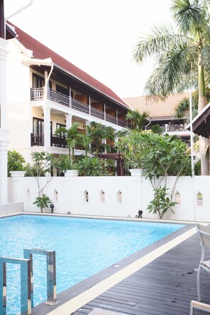 Outdoor pool, open 10:00 AM to 9:00 PM, pool umbrellas, pool loungers