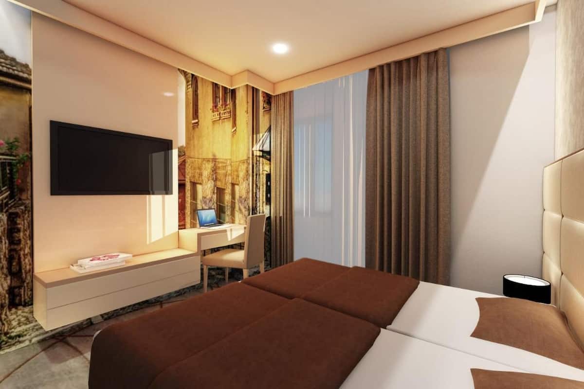 premium bedding, select comfort beds, in-room safe, desk