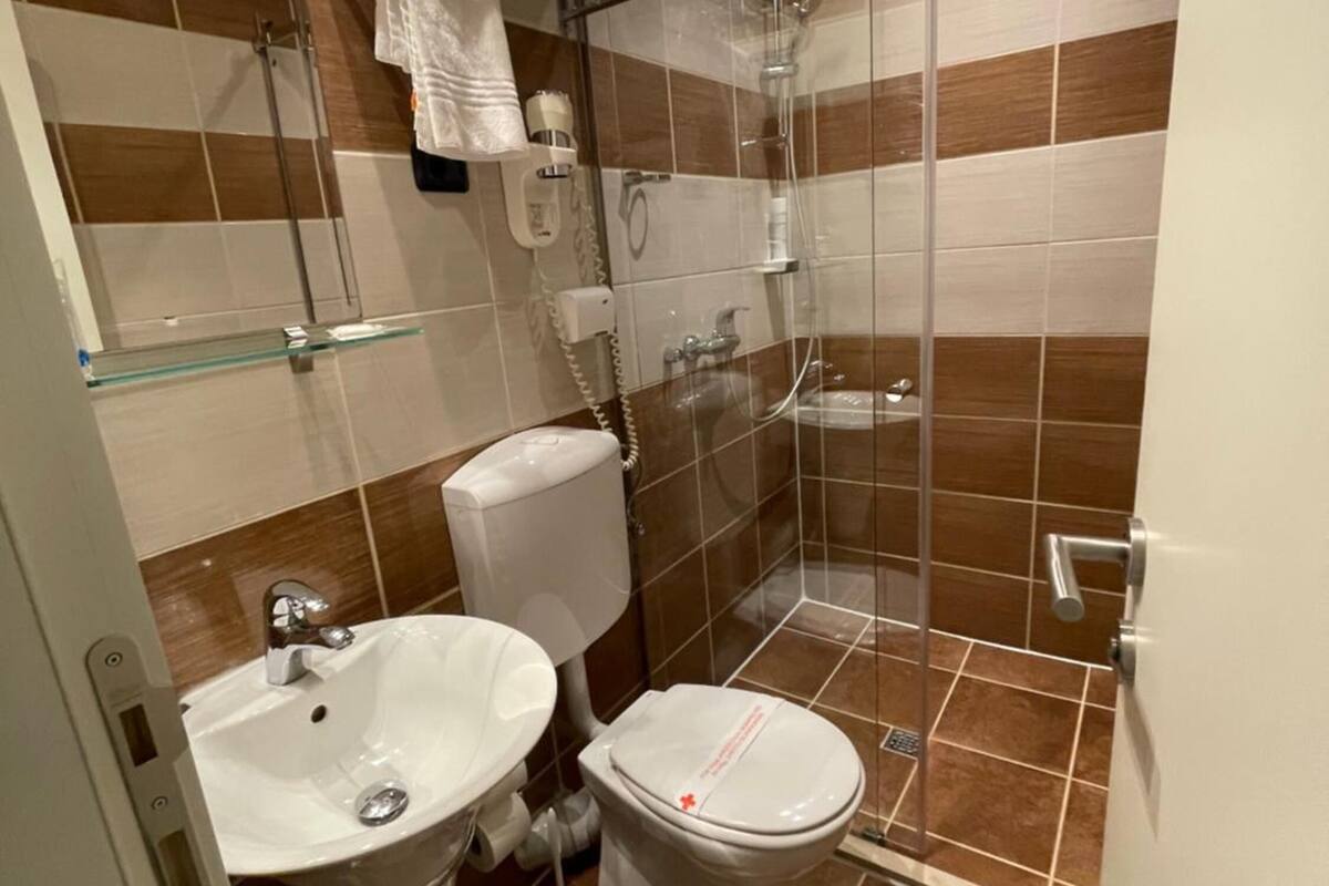 shower, free toiletries, hair dryer, slippers