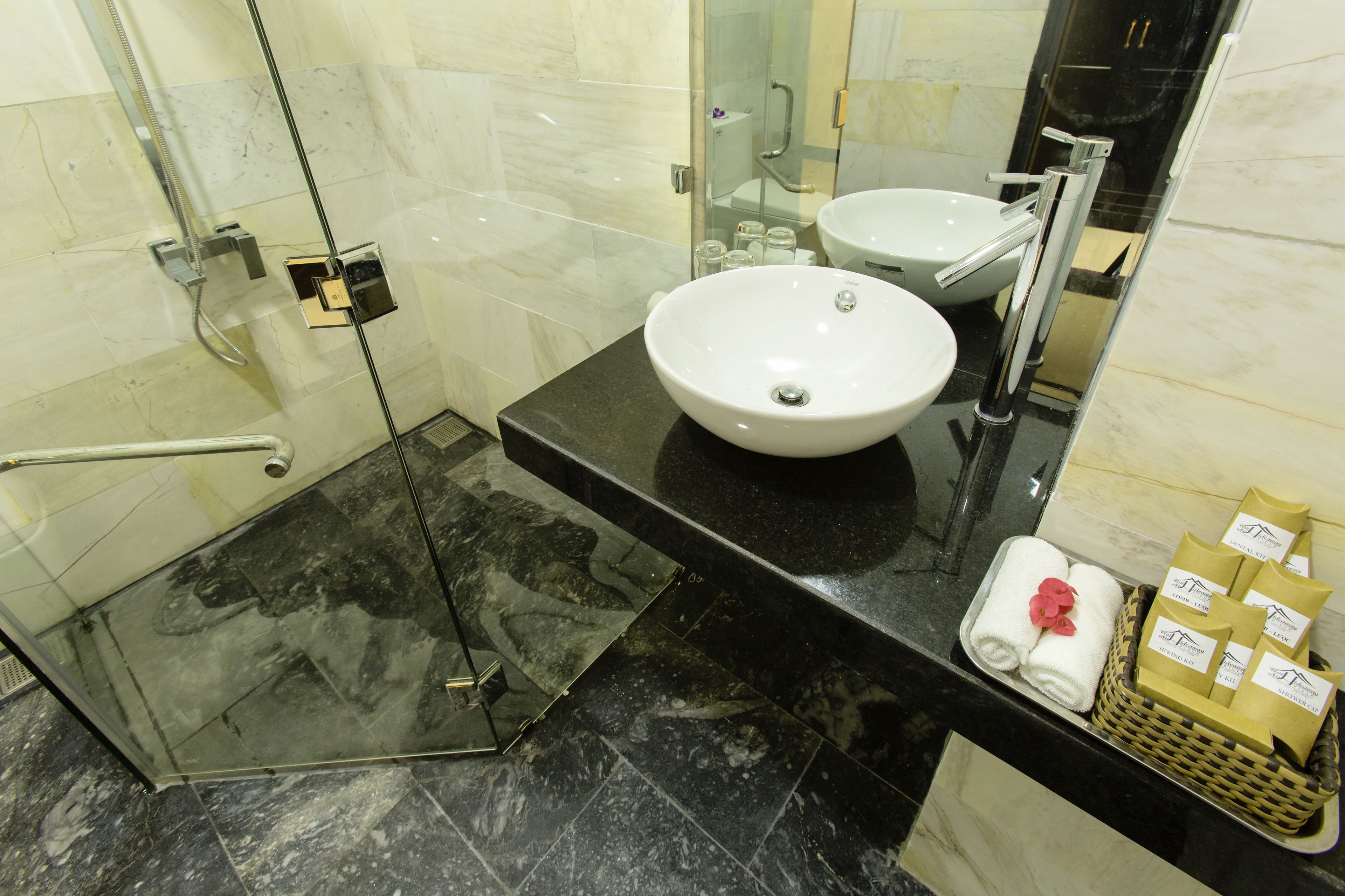 free toiletries, hair dryer, slippers, towels