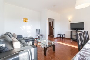 Apartment, 3 Bedrooms (Mid) | Living room | Flat-screen TV, DVD player