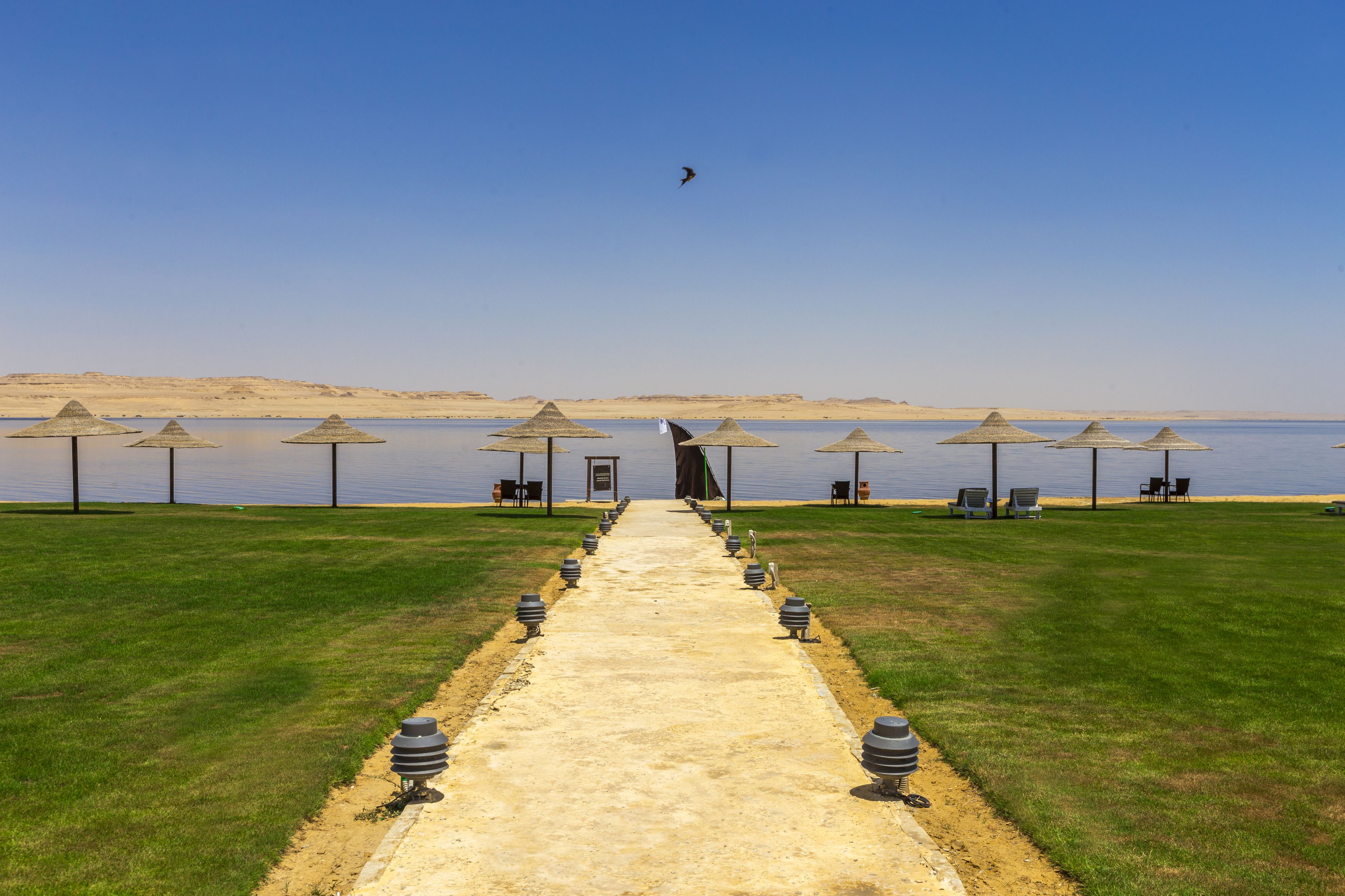 private beach, sun-loungers, beach umbrellas