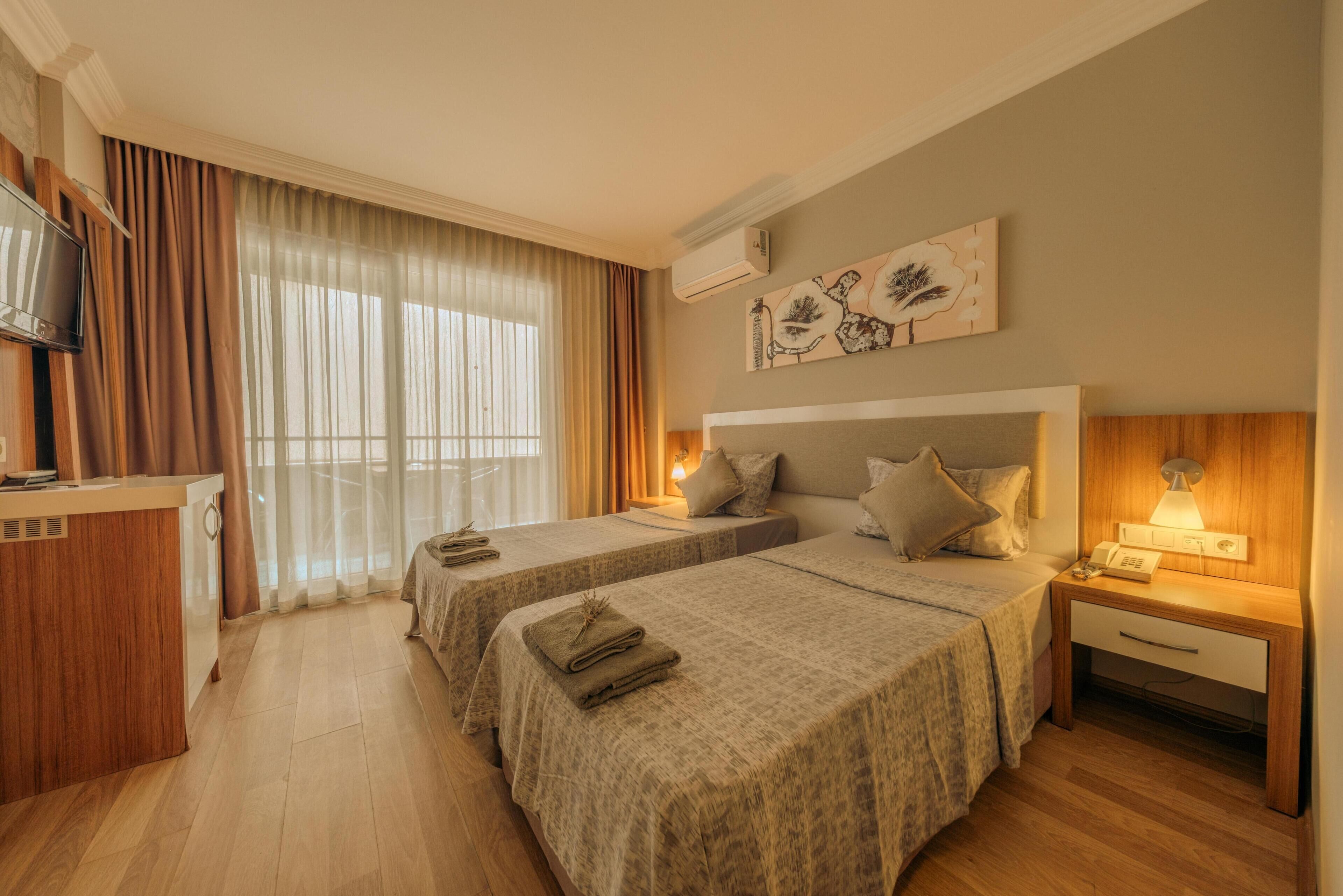 Minibar, desk, WiFi, bed sheets