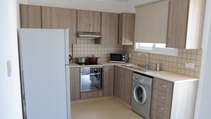 Apartment, 2 Bedrooms (Deluxe+) | Private kitchen | Full-sized fridge, microwave, oven, stovetop - Kiti Deluxe Apartments (Kiti)