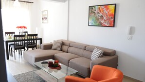 Apartment, 2 Bedrooms (Deluxe) | Living area | Flat-screen TV - Kiti Deluxe Apartments (Kiti)