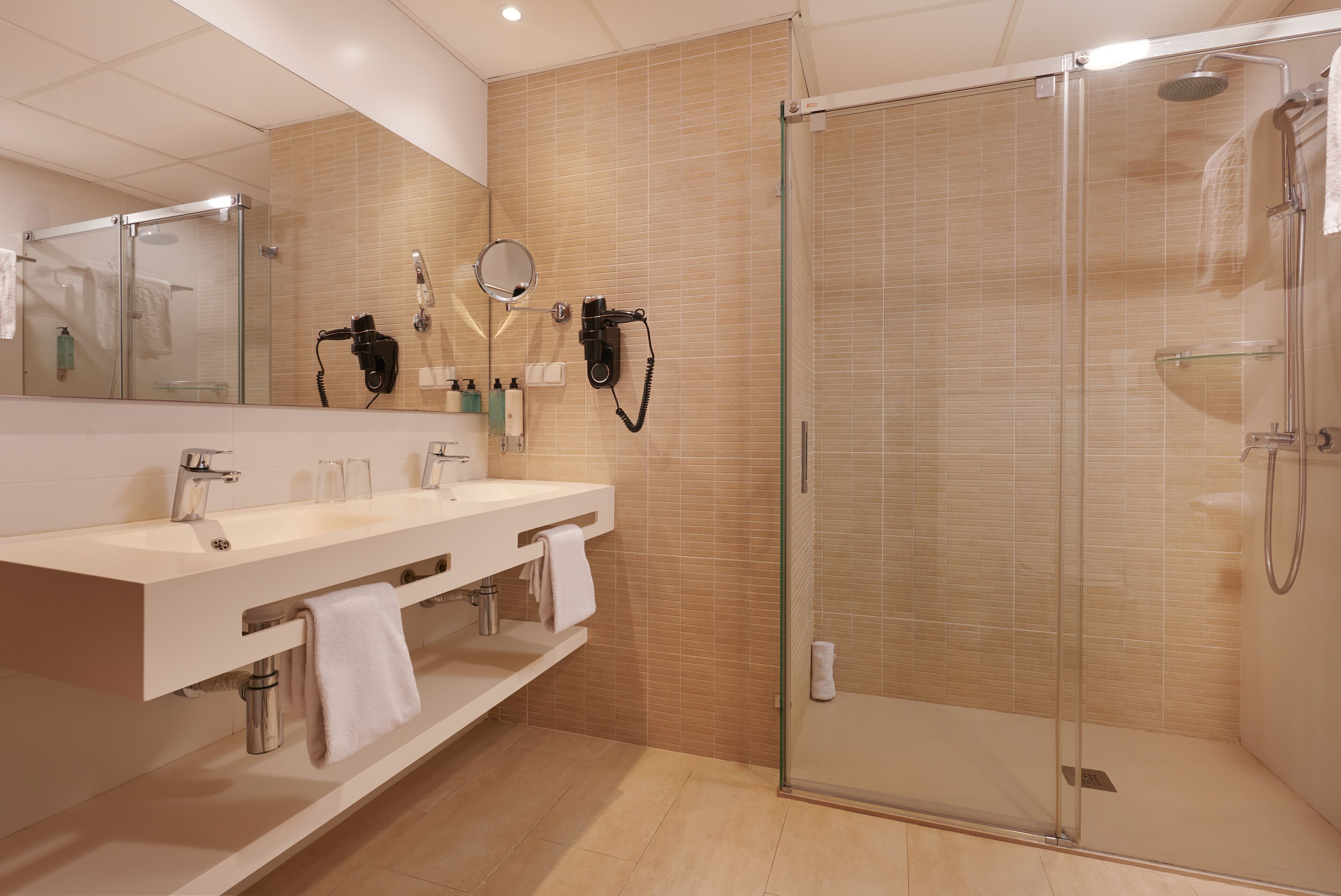 comfort apartment, 1 bedroom, balcony, poolside | bathroom | hair dryer, towels, soap, shampoo